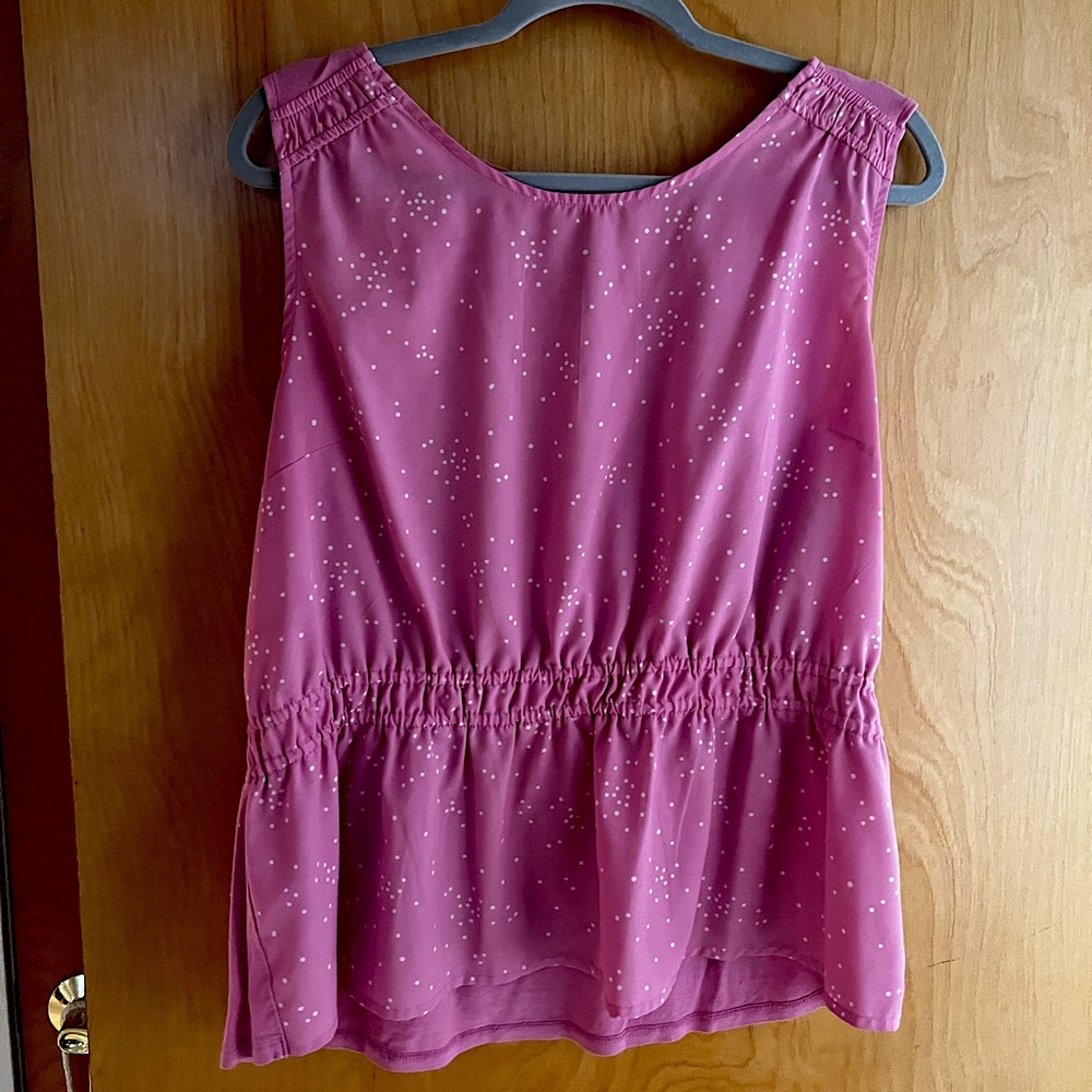 Pinkish/Purple blouse with white polka dots. Great fabric, Peplum style.